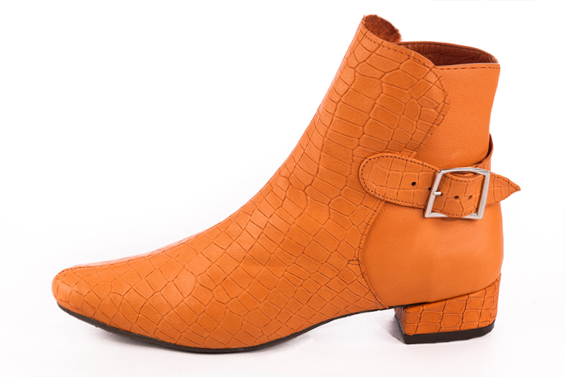 Apricot orange women's ankle boots with buckles at the back. Round toe. Low block heels. Profile view - Florence KOOIJMAN